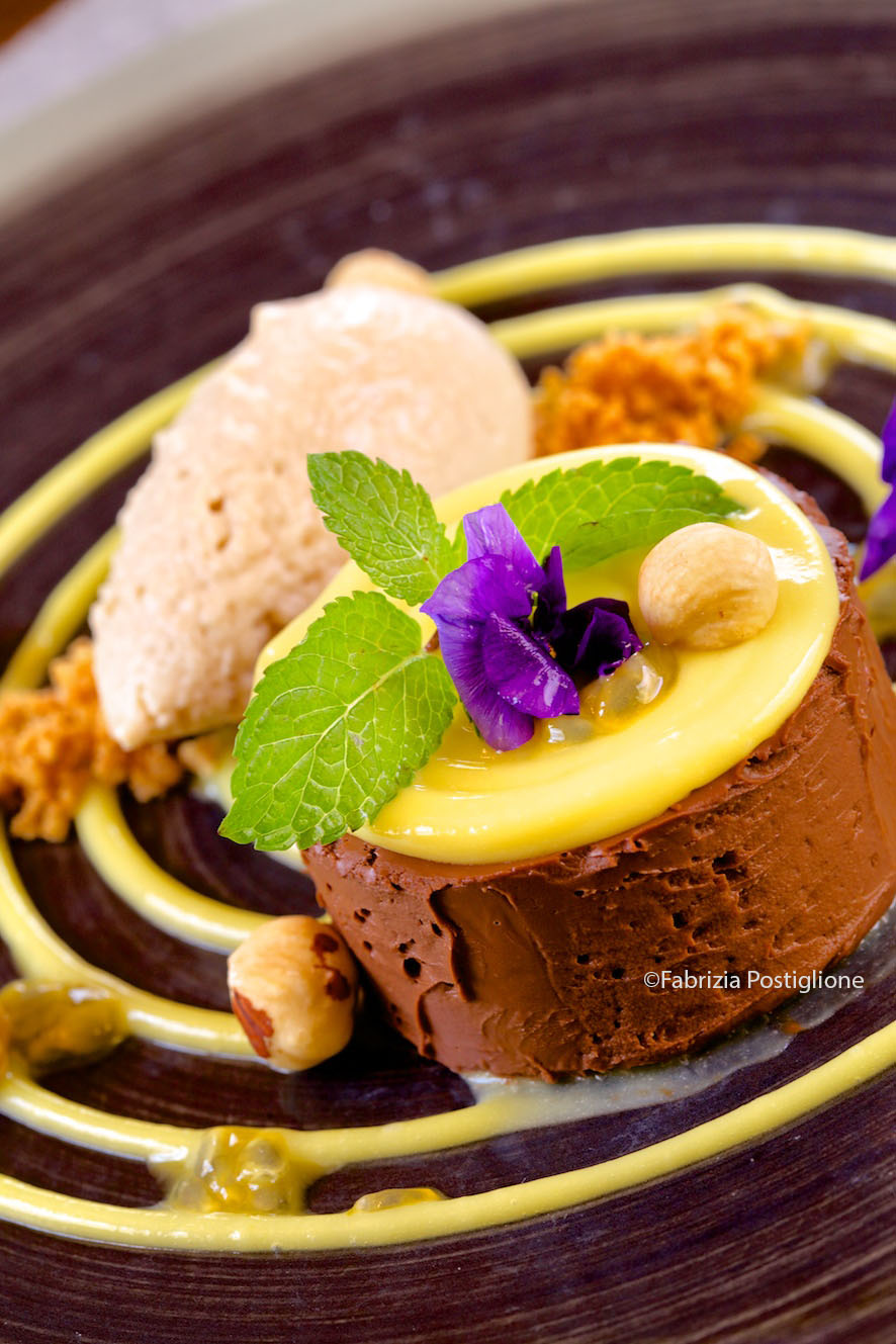 Italy. South Tyrol. Val Gardena Valley. Selva Gardena. Nives Boutique Hotel & Spa. The Nives Gourmet Restaurant: Chocolate Cake, Passion Fruit, Hazelnut Ice Cream (Tortino Morbido di Cioccolato al 65%, Frutto della Passione, Gelato alla nocciola).